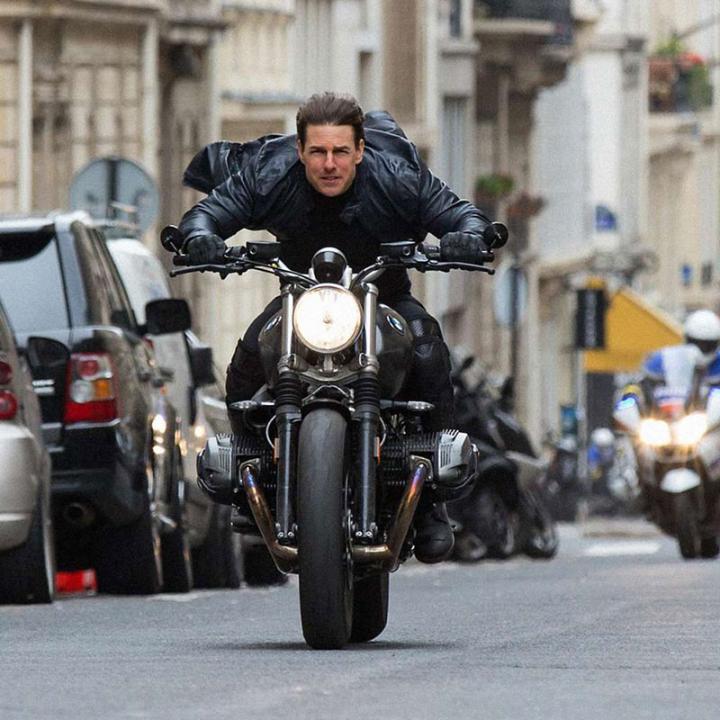Tom Cruise in Mission Impossible on a motorcycle 