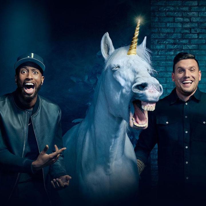Comedians with a unicorn