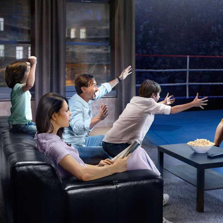 A family watching tv together