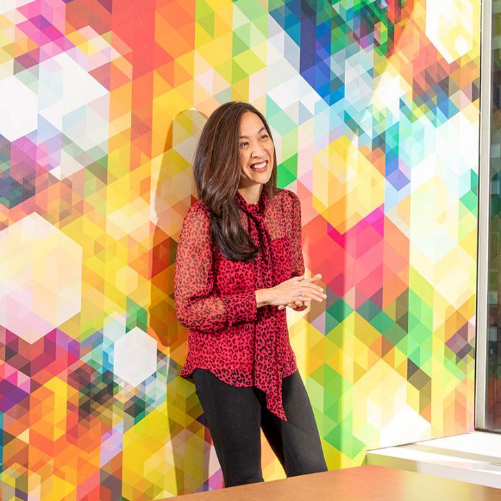 Katherine Liu against colorful wall