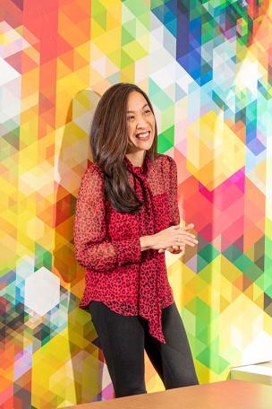 Katherine Liu against colorful wall